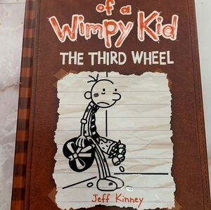 New dairy of a wimpy kid book 7 (The Third Wheel)
